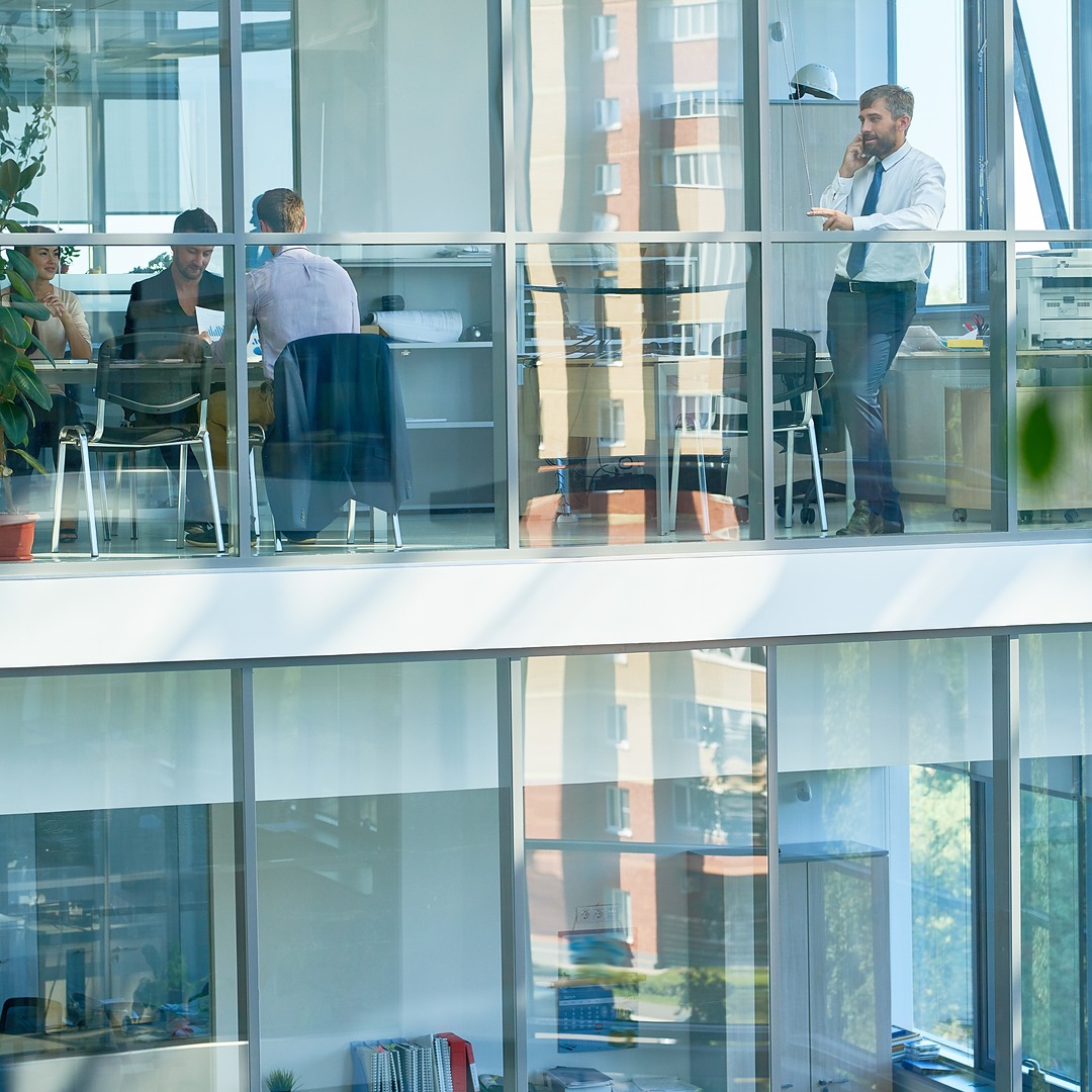 business-office-in-modern-glass-building-2025-03-06-15-59-11-utc-ig-square-1080-1080